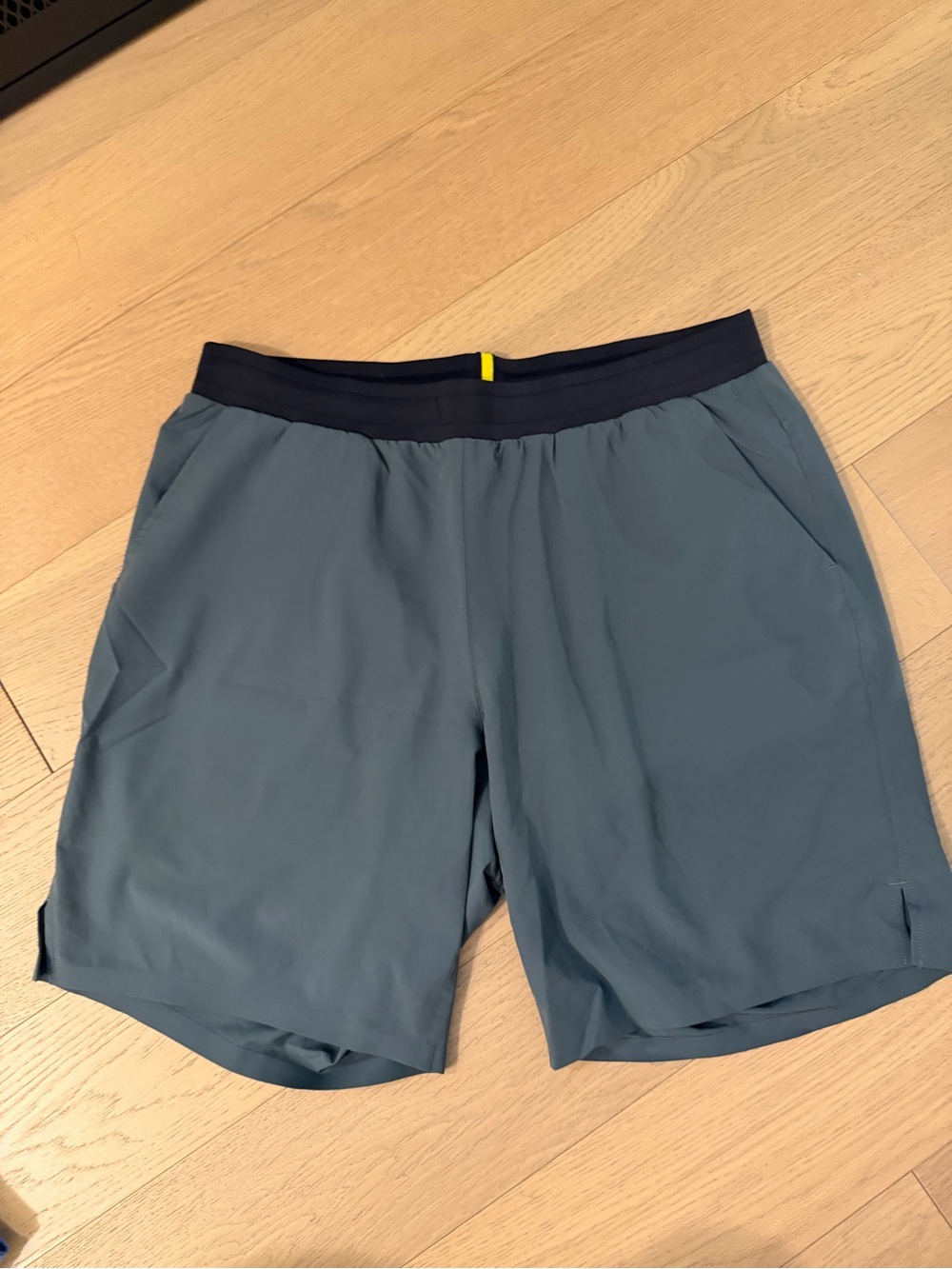 soulcycle Slate Blue Athletic Shorts with Navy Waistband and Yellow Accent